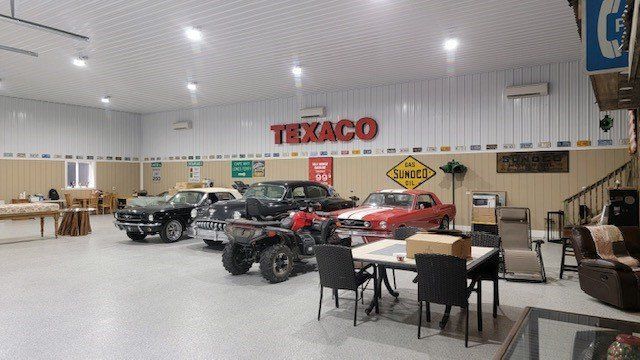 A showroom with a texaco sign on the wall
