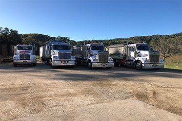 Trucks — Excavation Service in Round Mountain, NSW