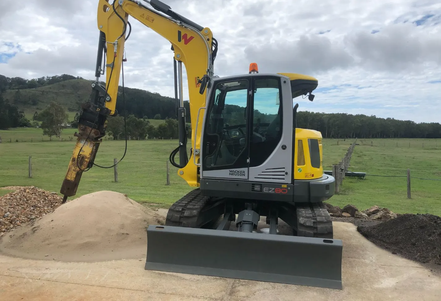 Yellow Excavator — Excavation Service in Round Mountain, NSW