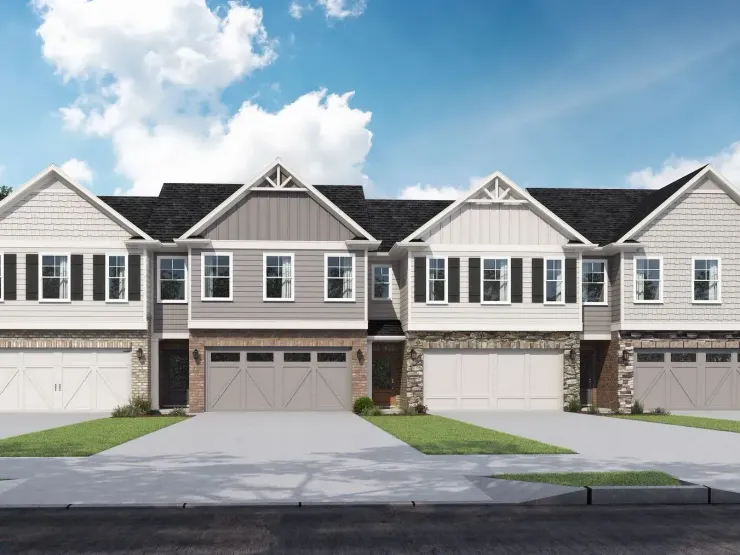 An artist 's impression of a row of houses with garages.