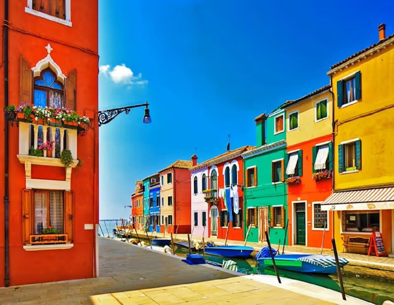 Enjoying a private boat excursion to Murano and Burano islands in the Venice lagoon.