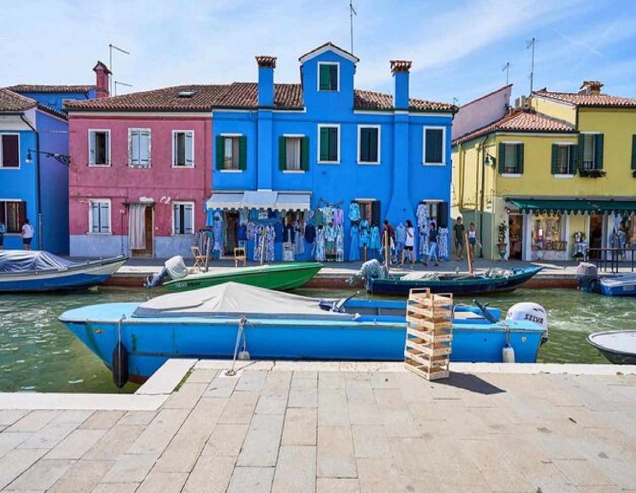 Colorful houses of Burano island during a private boat excursion