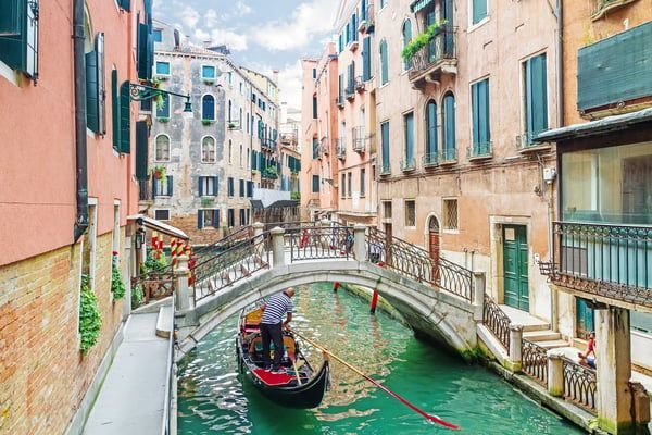 Gondola ride through quiet Venice canals with Ale Fragalla.