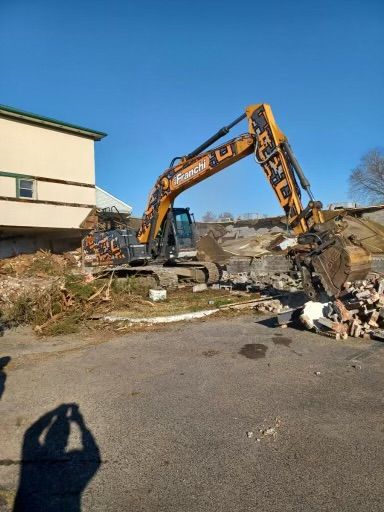 Excavator Cleaning The House Debris — Sewell, NJ — Mark  Franchi Demolition
