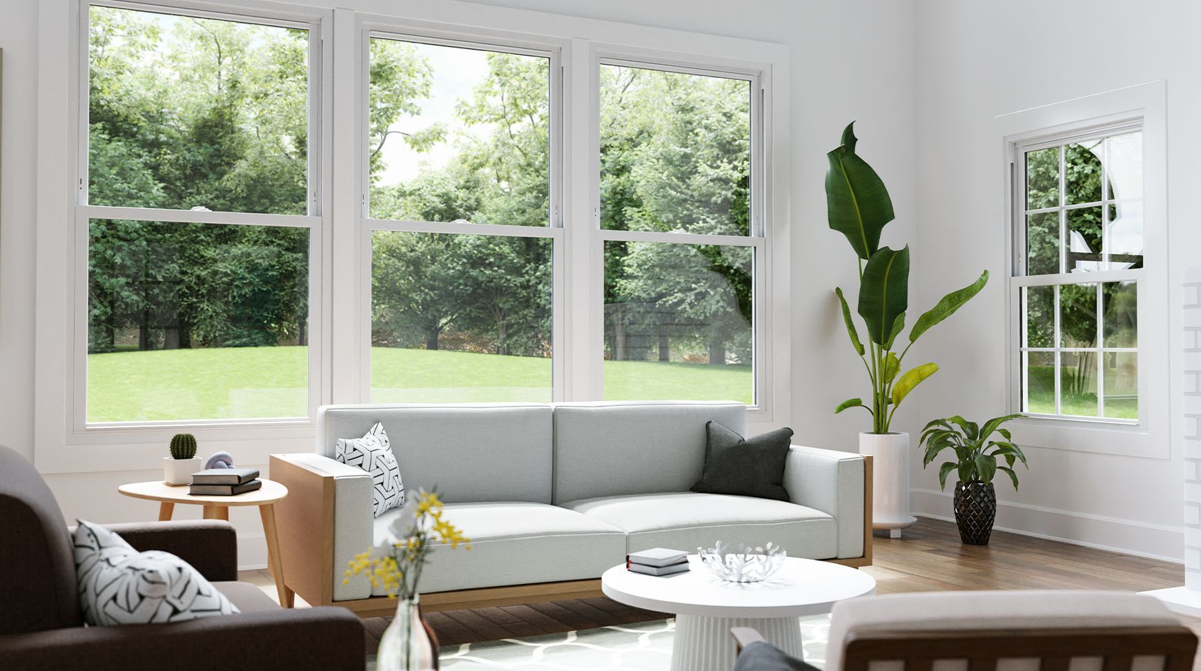 A living room with a couch , chairs , and a coffee table.