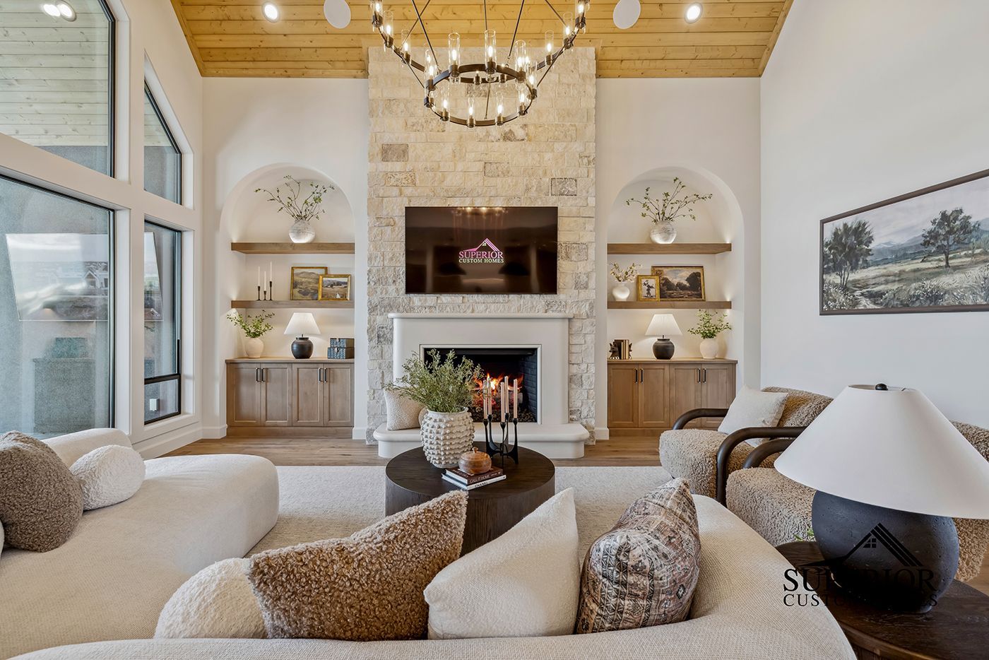 There is a fireplace in the middle of the living room.