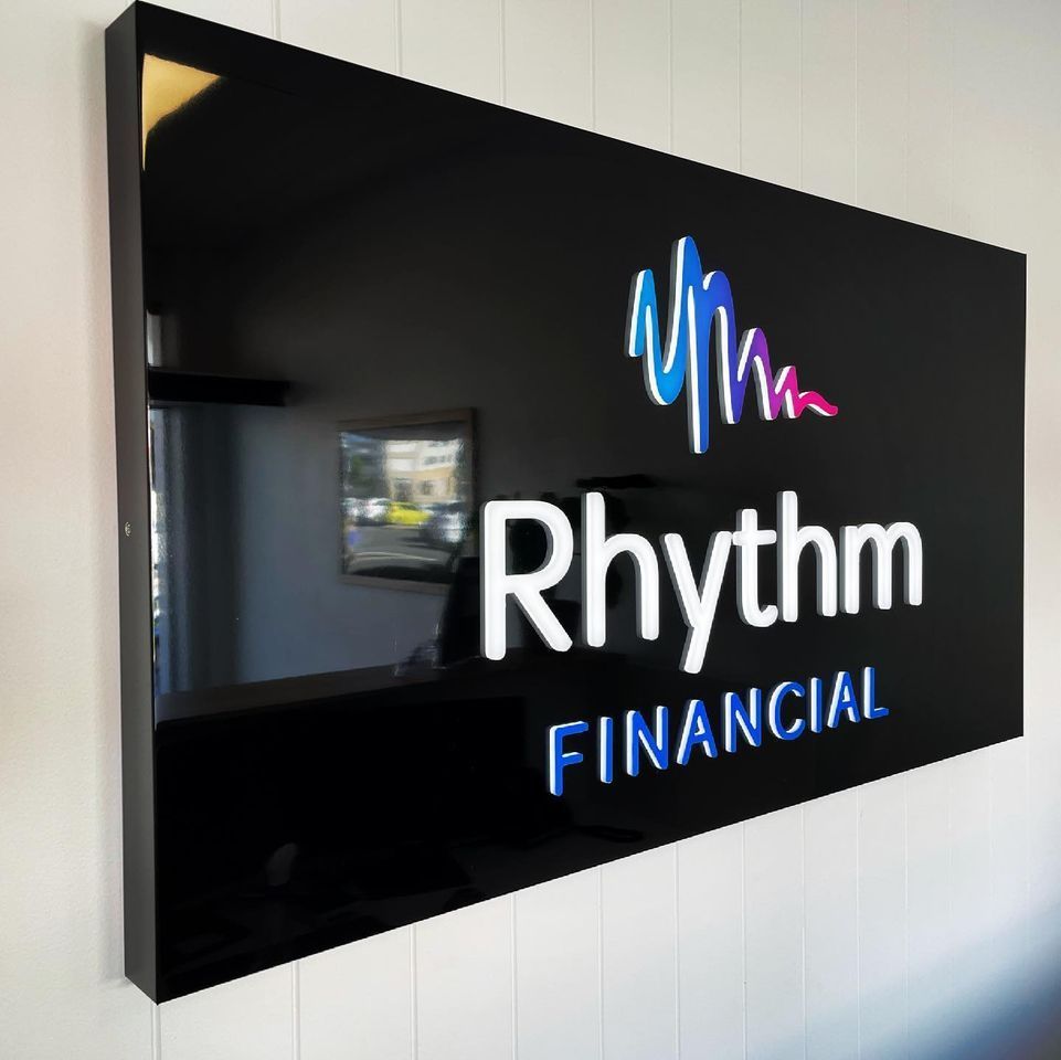 A Black Sign That Says Rhythm Financial on It — Sign Media Solutions in Ballina, NSW