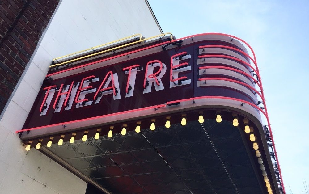 A Theatre Sign is Lit Up on the Side of a Building — Sign Media Solutions in Lismore, NSW