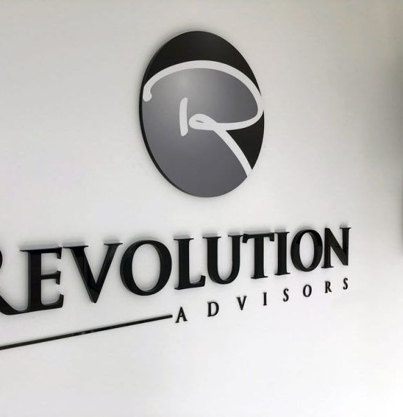 A Sign That Says Revolution Advisors on It — Sign Media Solutions in Ballina, NSW
