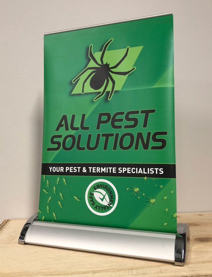 A Green Sign That Says All Pest Solutions on It — Sign Media Solutions in Ballina, NSW