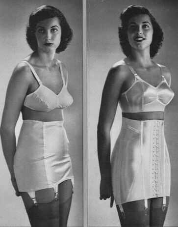 A woman is wearing a bra and a girdle in a black and white photo.