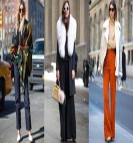Three women are standing on a street wearing different outfits