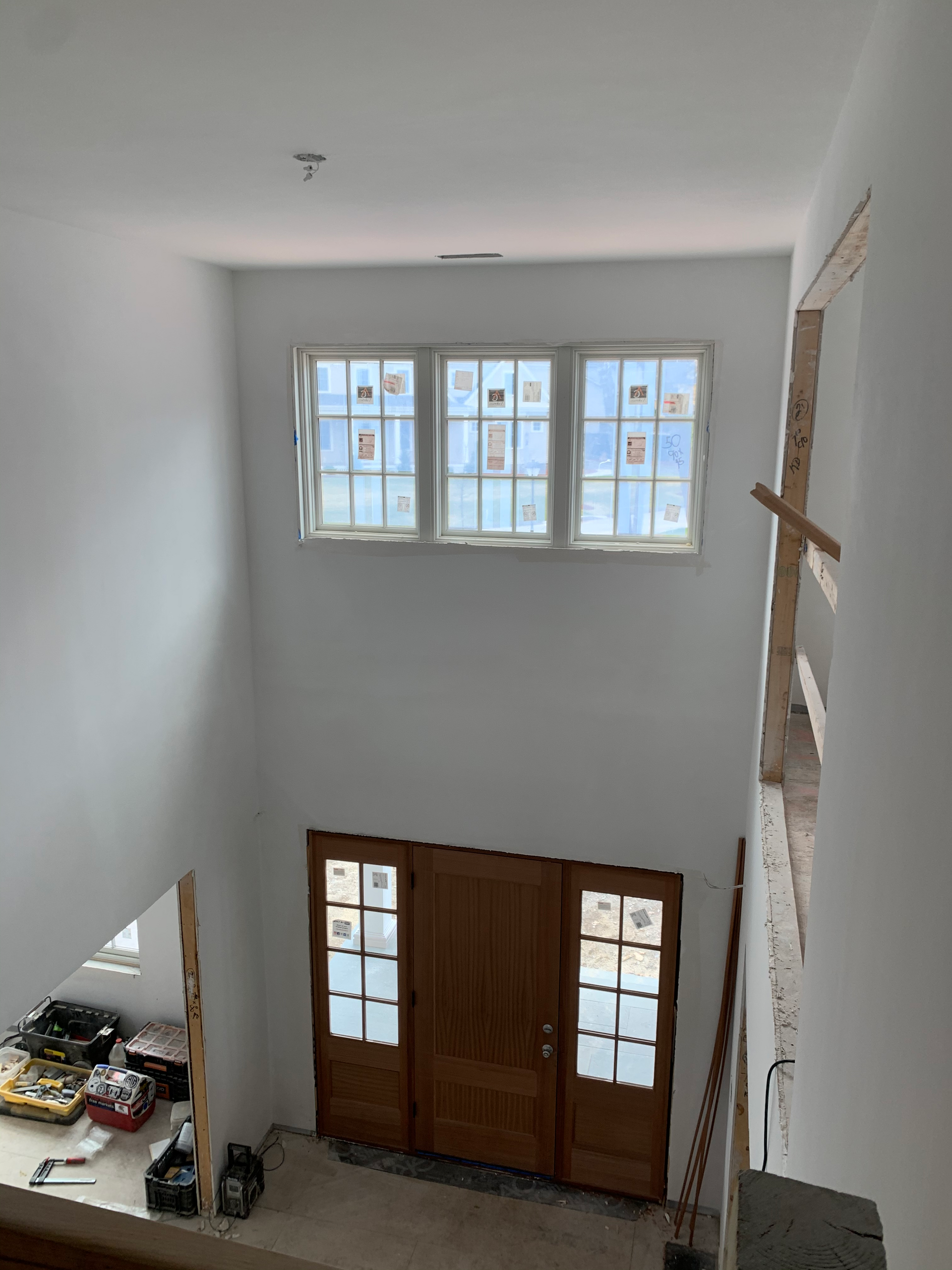 A view of a house under construction from the second floor.
