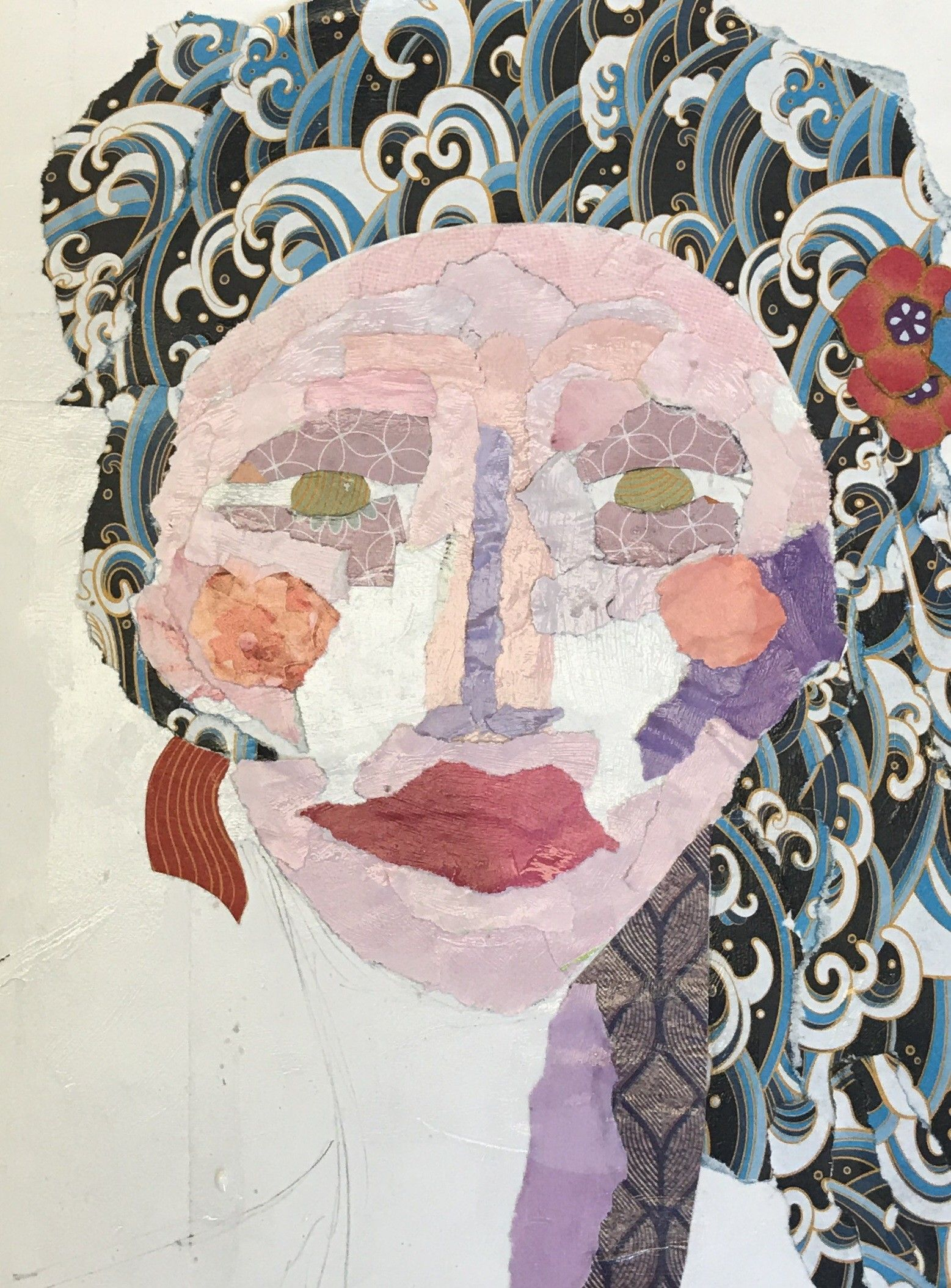 Collage portrait of a woman with pink skin, blue patterned hair, and a red flower.