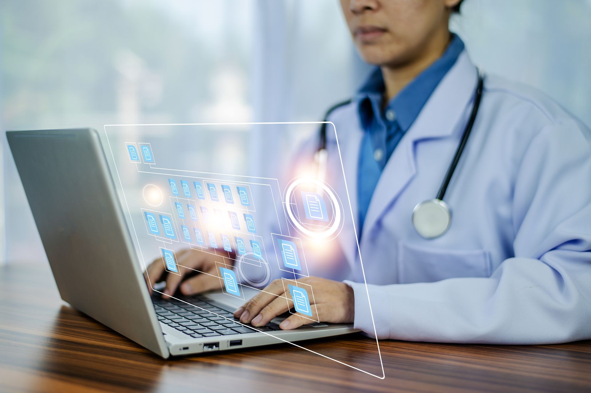 A health professional using healthcare administrative software integrations.