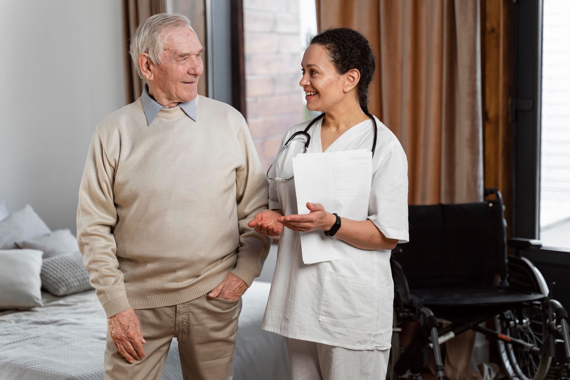 A PACE program healthcare provider engages with a senior patient during a routine check-up.