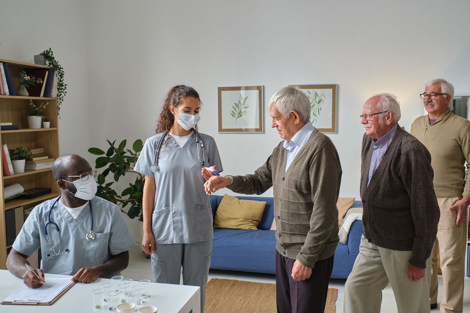 A healthcare team performing health assessments for seniors under a PACE program.