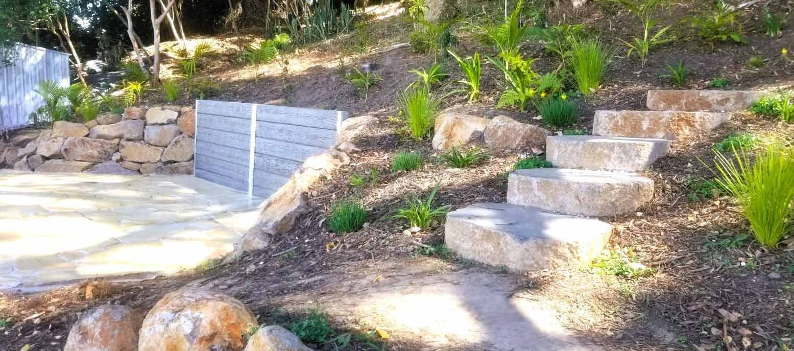 There Are Stairs Going Up a Hill in the Middle of a Garden — Full Circle Landscaping in Ballina, NSW