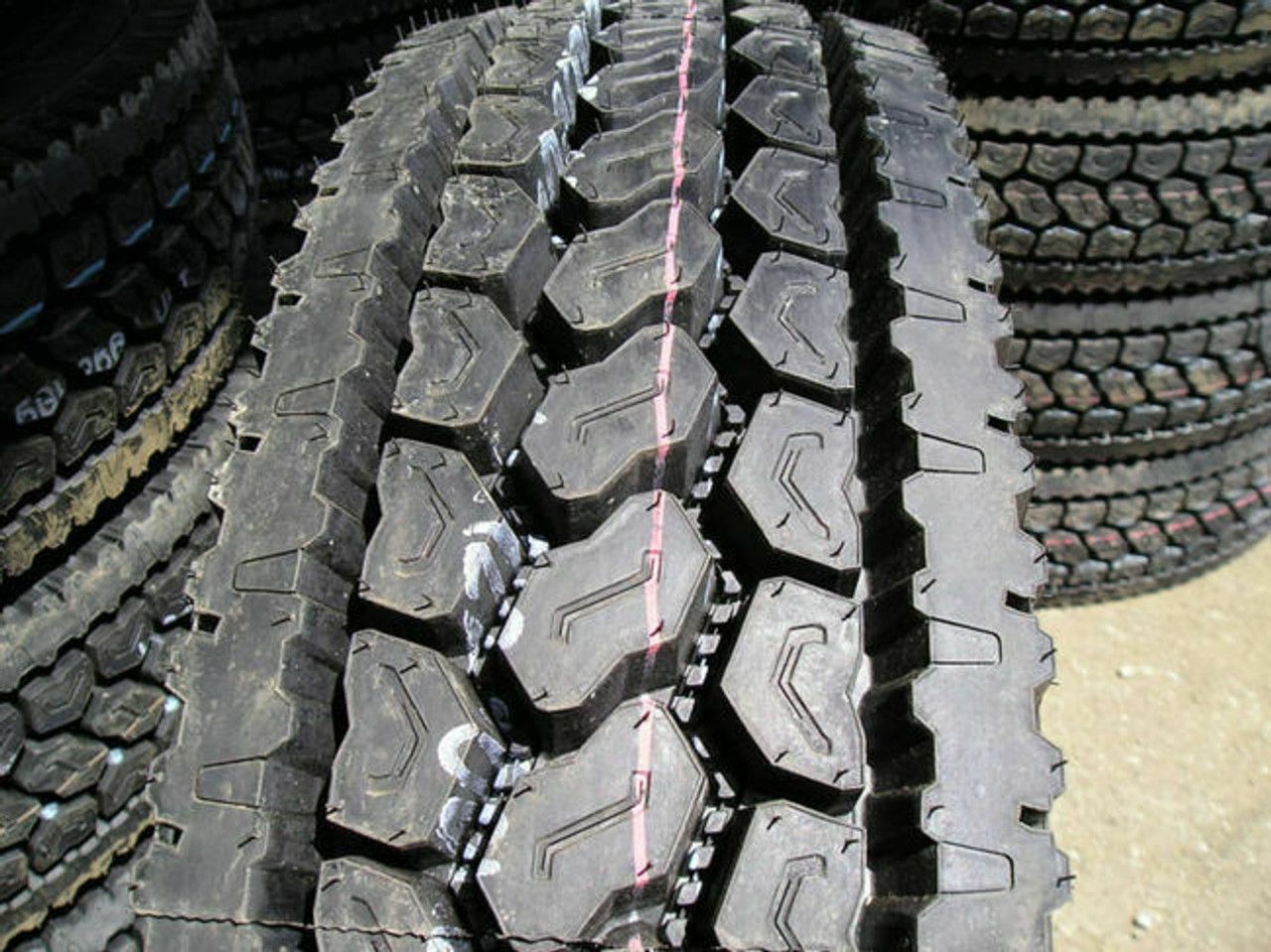A close-up of an Advance+GL266D drive tire