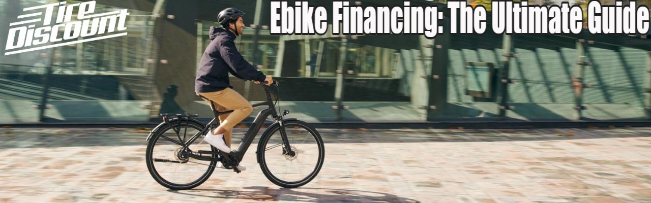 a man is riding an electric bike on a city street .