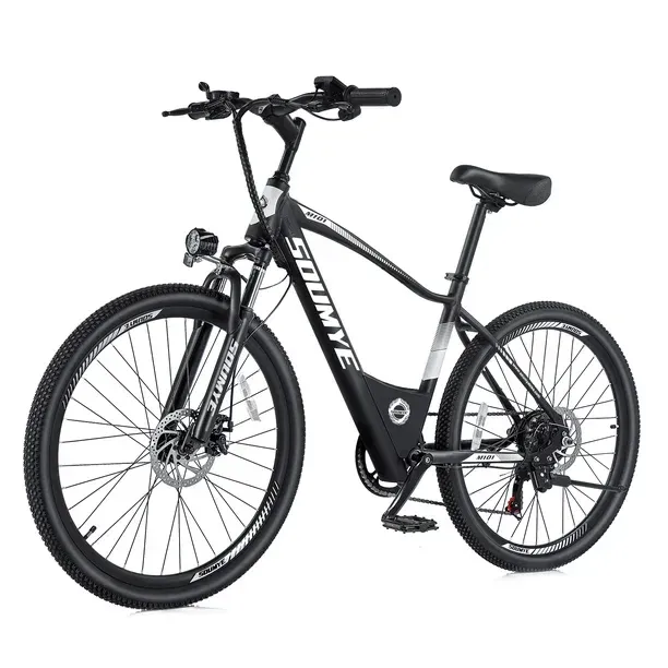 A black electric bike is sitting on a white surface.