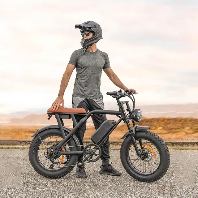 A man wearing a helmet is standing next to an EB01 electric bike.