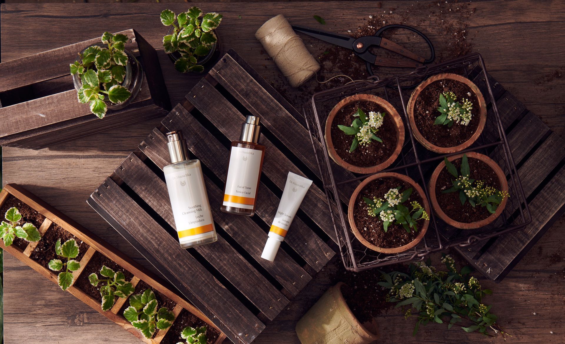 a bottle of dr. hauschka cosmetics sits on a wooden crate