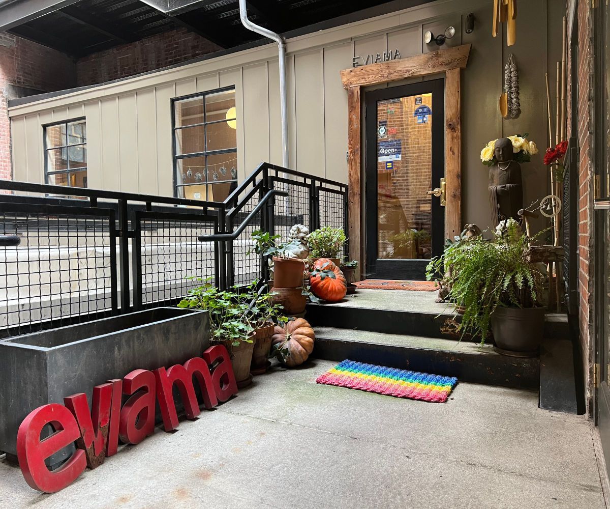 a patio with a sign that says ewa on it