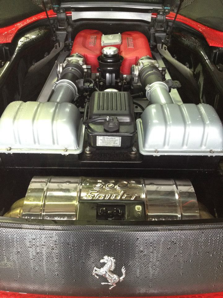 A Close Up Of The Engine Of A Red Ferrari — Marcoola Tyre & Mechanical In Marcoola, QLD