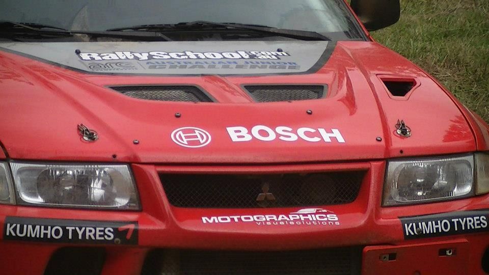 A Red Car With The Word Bosch On The Front— Marcoola Tyre & Mechanical In Marcoola, QLD