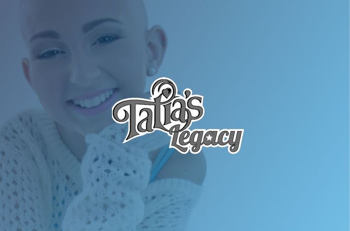 A woman is smiling in front of a logo for talia 's legacy.