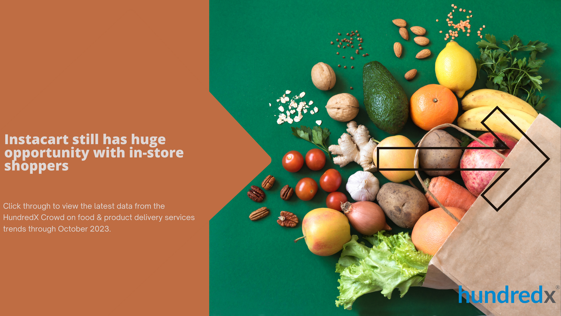 A bag filled with fruits and vegetables on a green table.