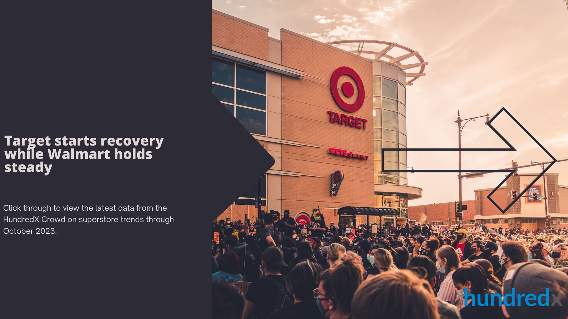 A large crowd of people are gathered in front of a target store.