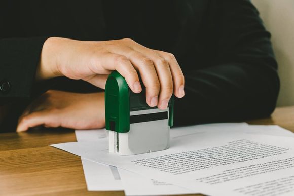 lawyer stamping legal documents