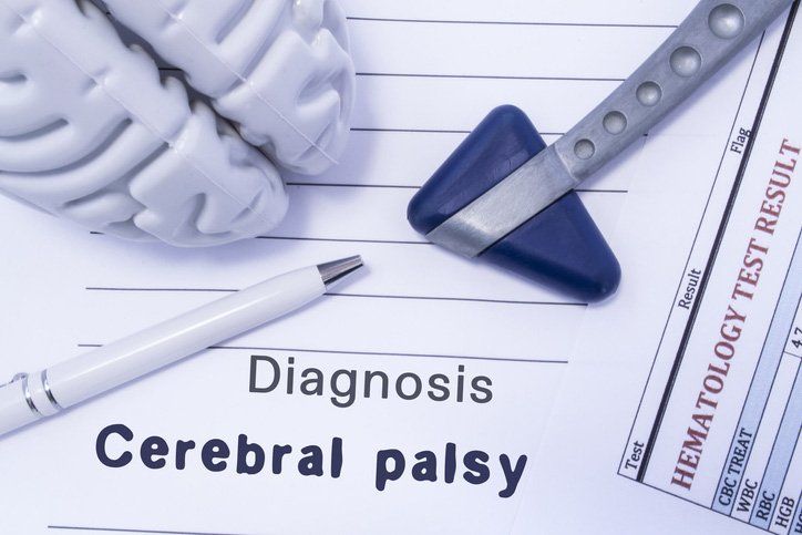 Cerebral Palsy — Brain Figure,  Neurological Hammer, Printed on a Paper Blood Test and Written Diagnosis of Cerebral Palsy in Medical Form in Chicago, IL