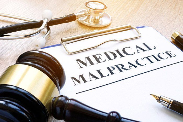 Medical Malpractice — Gavel and Clipping Board with Stethoscope in Chicago, IL