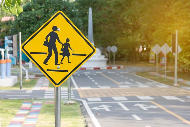 Personal Injury Law Firm — Pedestrian Crossing Sign In Chicago, IL