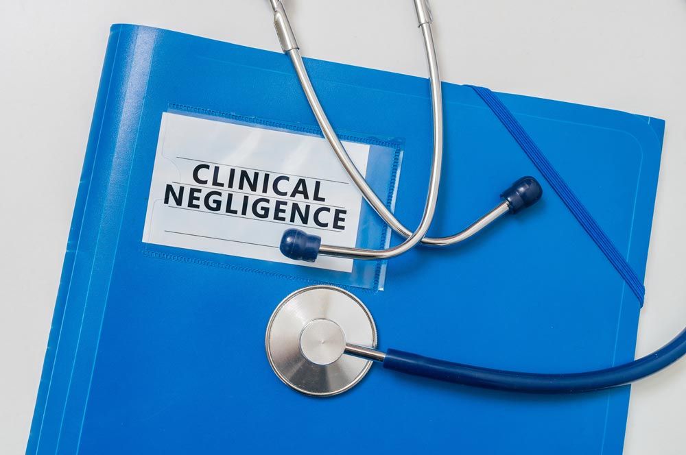 Medical Malpractice Lawsuits — Blue Folder With Clinical Negligence in Chicago, IL