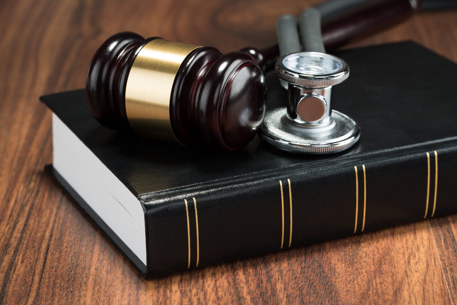Medical Negligence — Gavel And Stethoscope On Book in Chicago, IL