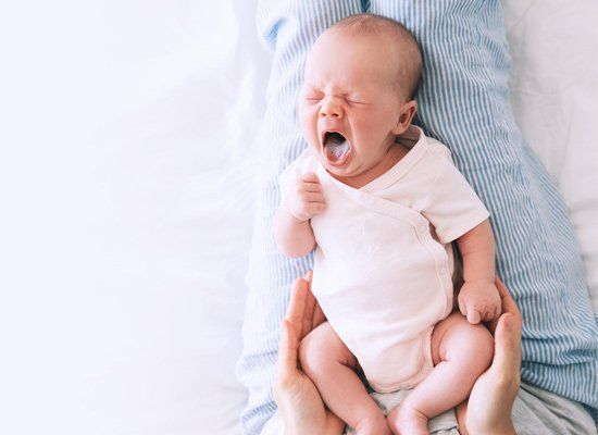 Medical Malpractice Attorney — Newborn Baby Girl Sleeps And Yawning in Chicago, IL