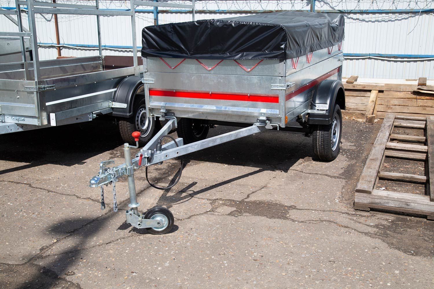 A trailer with a black tarp on top — Garden City, ID — Barton’s Hitch & Trailer Service