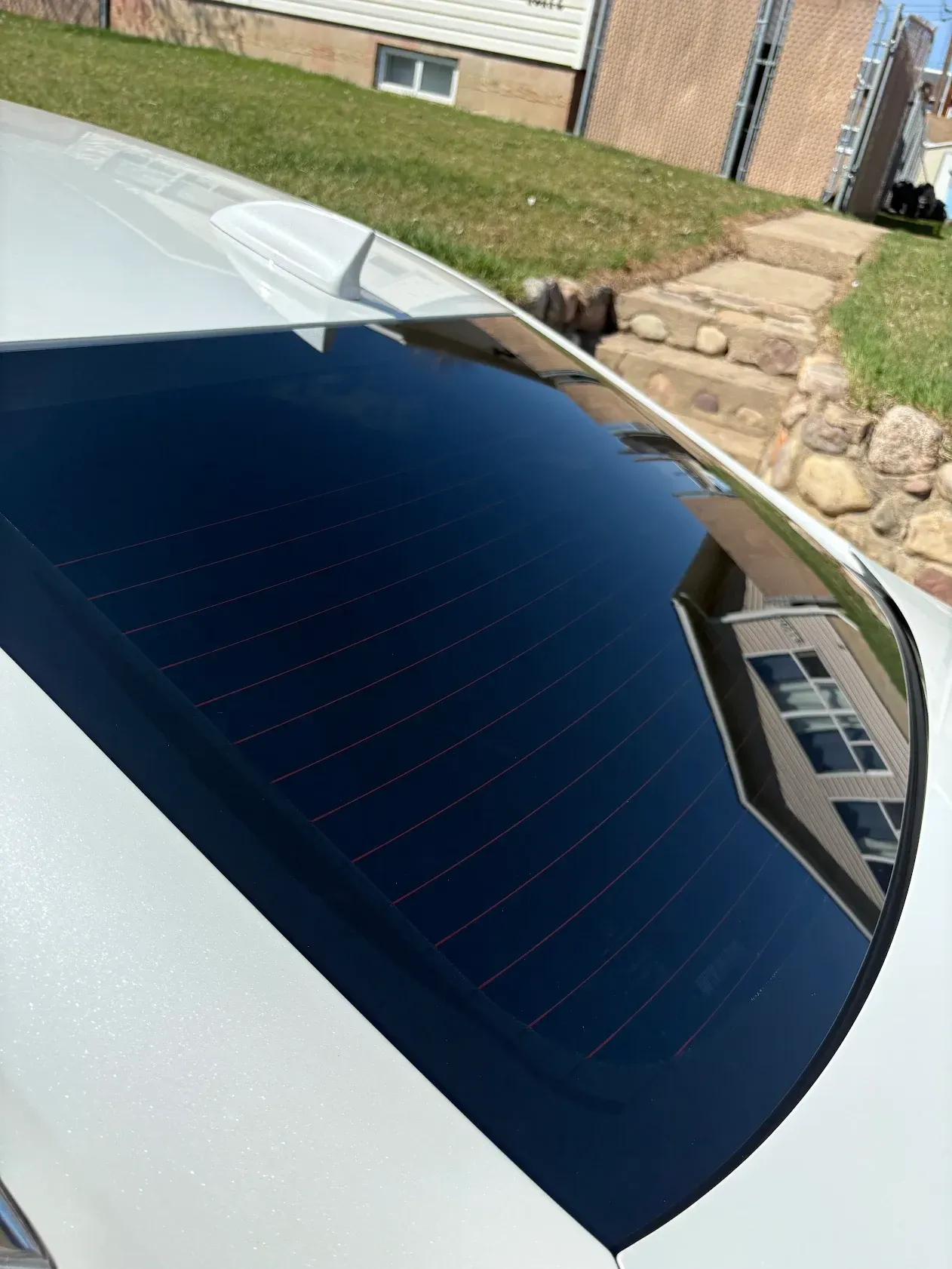 The window tint on a car is complete.