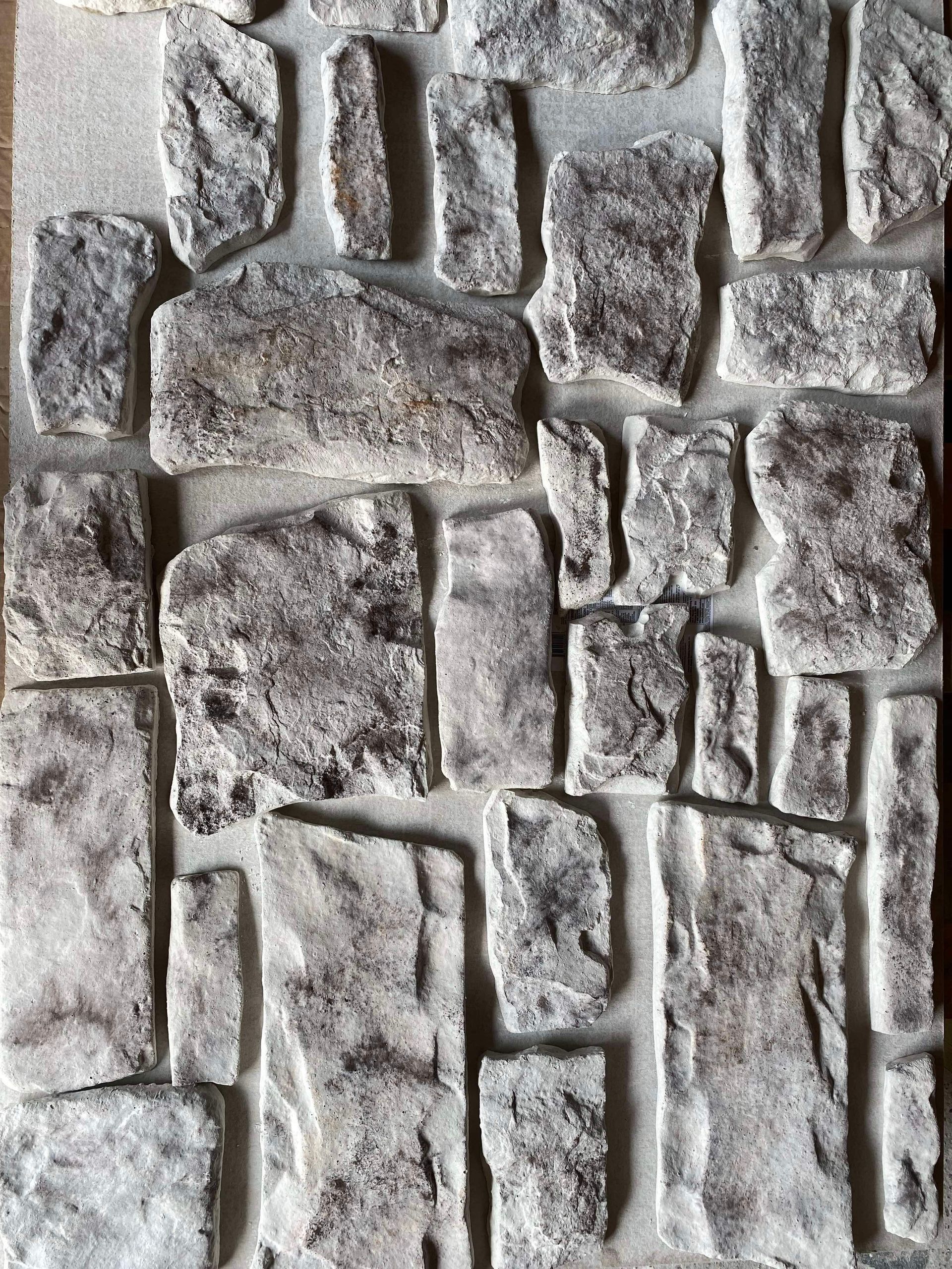 A close up of a piece of stone on a table.