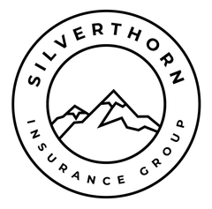 Logo of "Silverthorn Insurance Group" with a mountain range inside a circle.