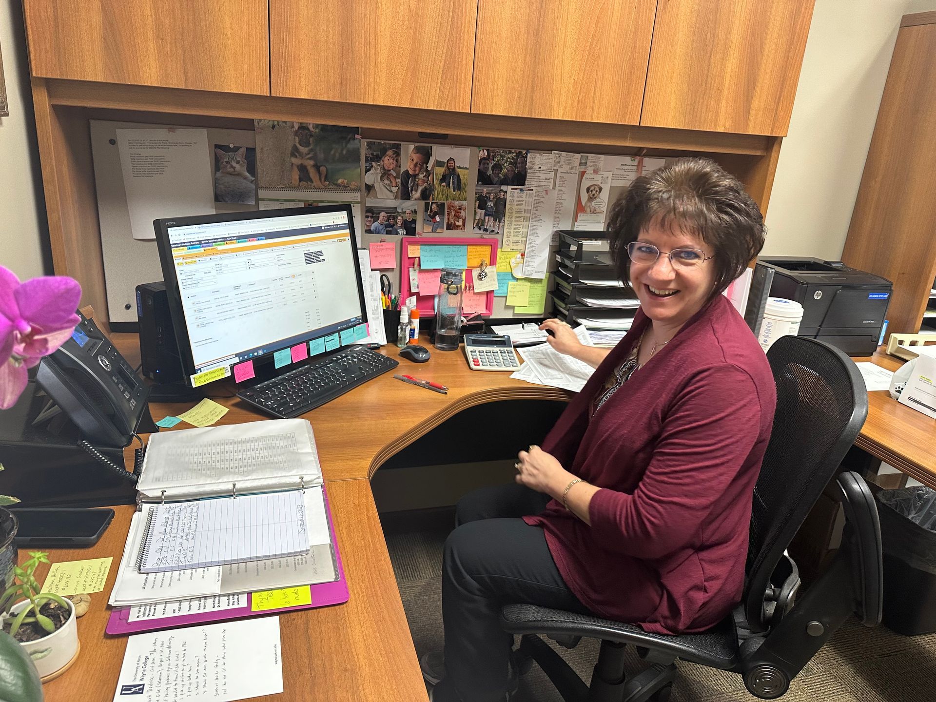 Michele working on a computer