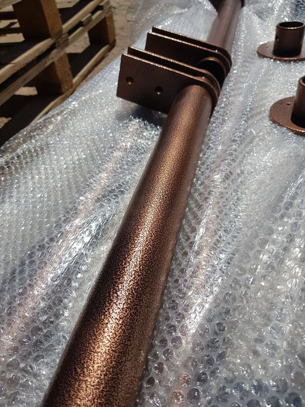 A close up of a metal pipe covered in bubble wrap