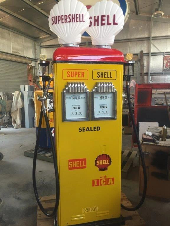 A yellow and red supershell shell gas pump