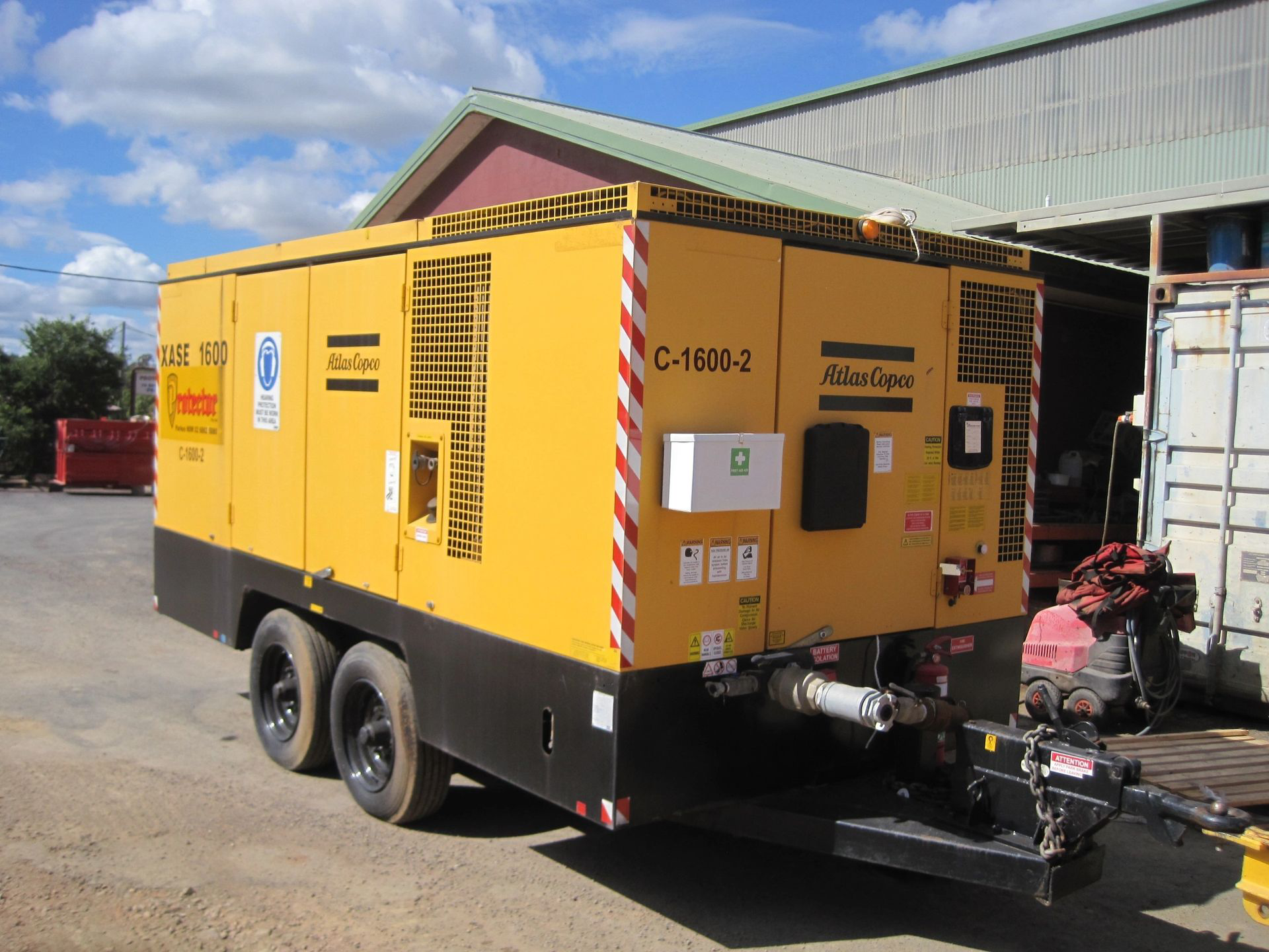A yellow trailer with the number c-188k-2 on it