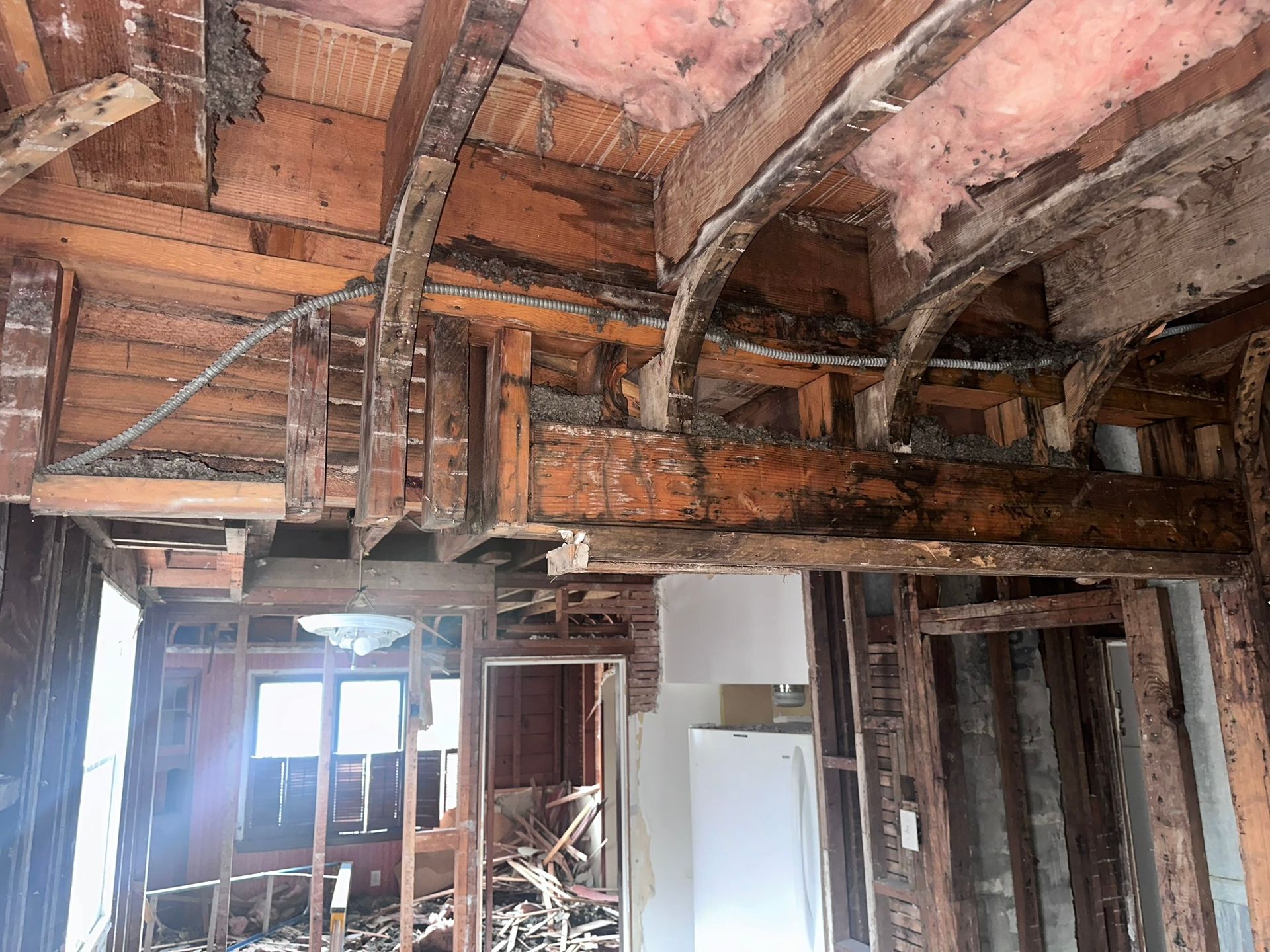 A house is being demolished and the ceiling is being removed.