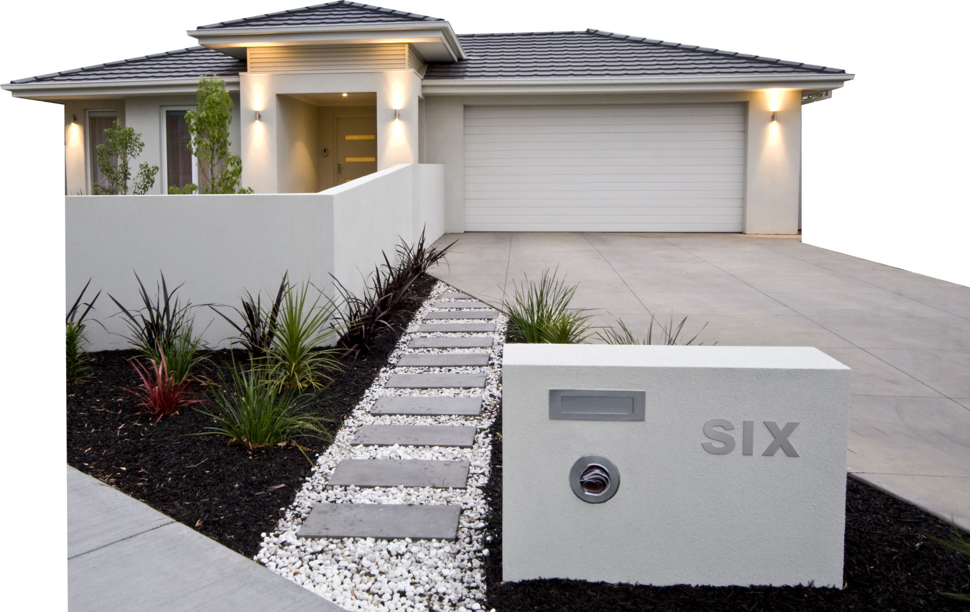 Modern white rendered house exterior with driveway, landscaping, and a mailbox labelled “SIX”